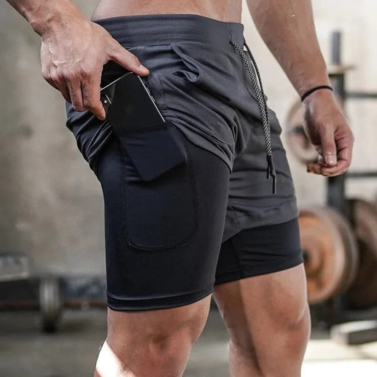 Victor | Graue atmungsaktive elastische Sportshorts für Männer