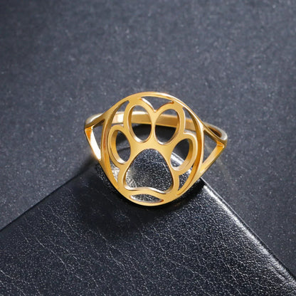 PAWLA – Offener Gold und silber ring mit Pfotenmotiv